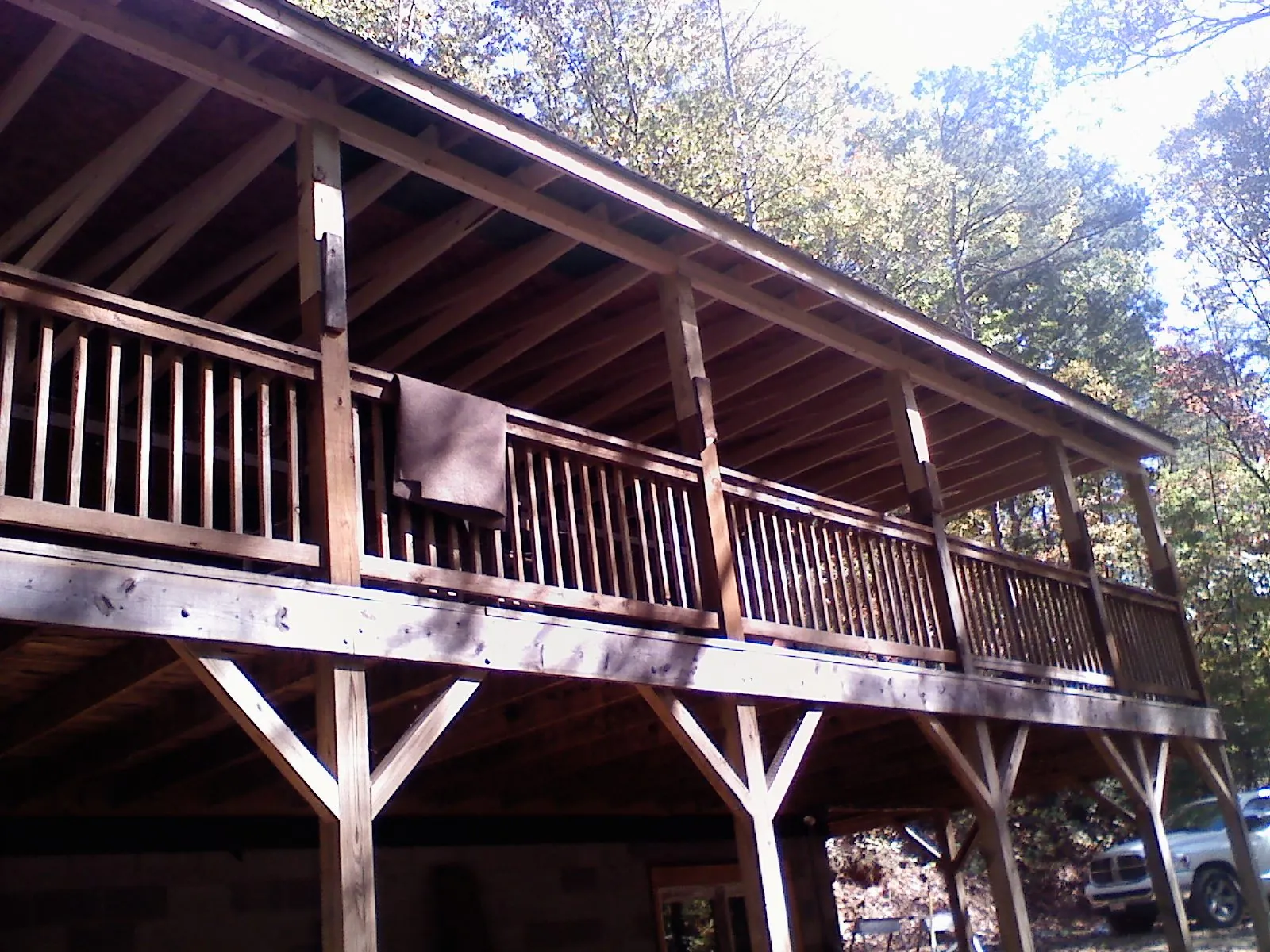 Timber framing under a new elevated porch and deck — Roof Leak Repair in El Paso by Roofing Brothers